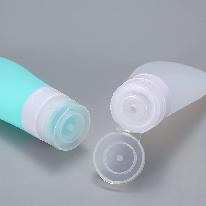 2 Pcs Silicone Travel Bottles,2oz Leak Proof Refillable Squeeze Containers with Transparent Carry Bag,Small Empty Travel Size Bottles for Shampoo,Conditioner,Lotion,Toiletries