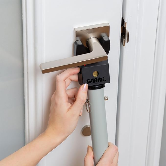 SABRE Adjustable Door Security Bar with Vibration Detecting Alarm, 115dB Alarm Audible Up To 1,100 Ft (335 m), Adjusts To Fit Most Hinged & Sliding Doors, Rubberized Foot for Strong Grip, Collapsible