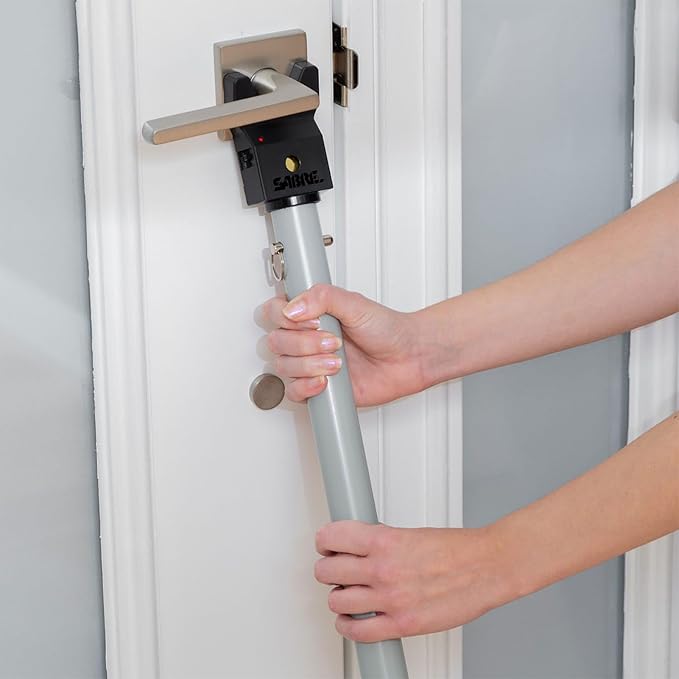 SABRE Adjustable Door Security Bar with Vibration Detecting Alarm, 115dB Alarm Audible Up To 1,100 Ft (335 m), Adjusts To Fit Most Hinged & Sliding Doors, Rubberized Foot for Strong Grip, Collapsible