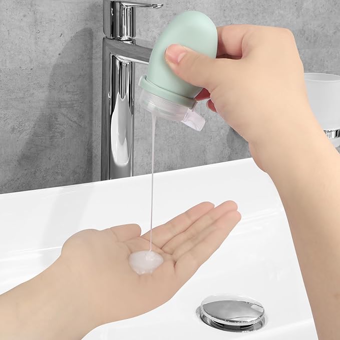 1oz Travel Bottles for Toiletries–4-Pack TSA Approved Silicone Leakproof with Secure Silicone Strap, Reusable Portable Travel Size Containers for Shampoo, Lotion, Gym, Airplane (Multi-Color)