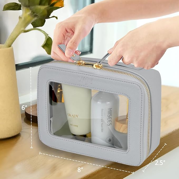 NGIL Clear Faux Leather Travel Toiletry Bag, Makeup Bag Organizer for Women, Clear Window & Gold Zipper Makeup Bag, Road Trip Essential, Skincare, Cruise Ship Essentials (Grey)